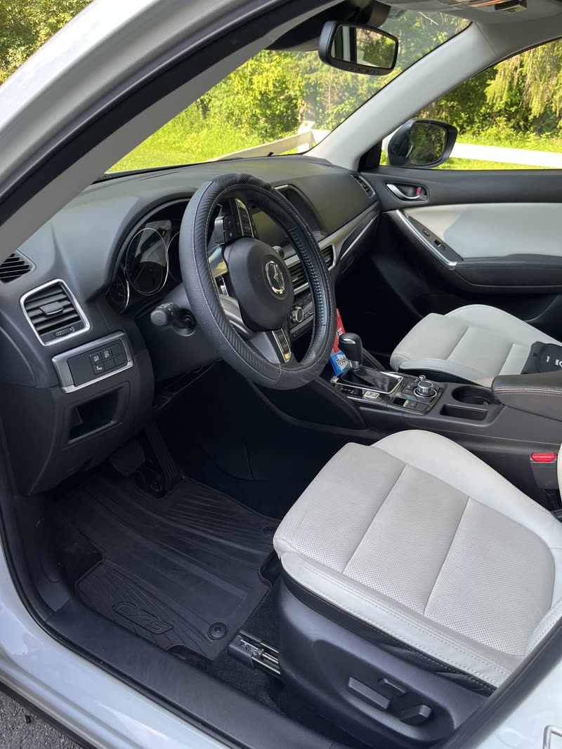 Mazda CX-5 interior with light leather seats after cleaning