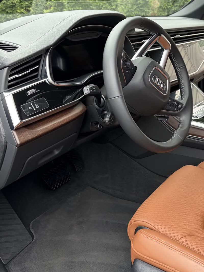 Audi front interior and floor mats after an interior detail